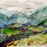 A farm nestled among rolling hills.