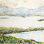 River with verdant banks and hills in the distance.